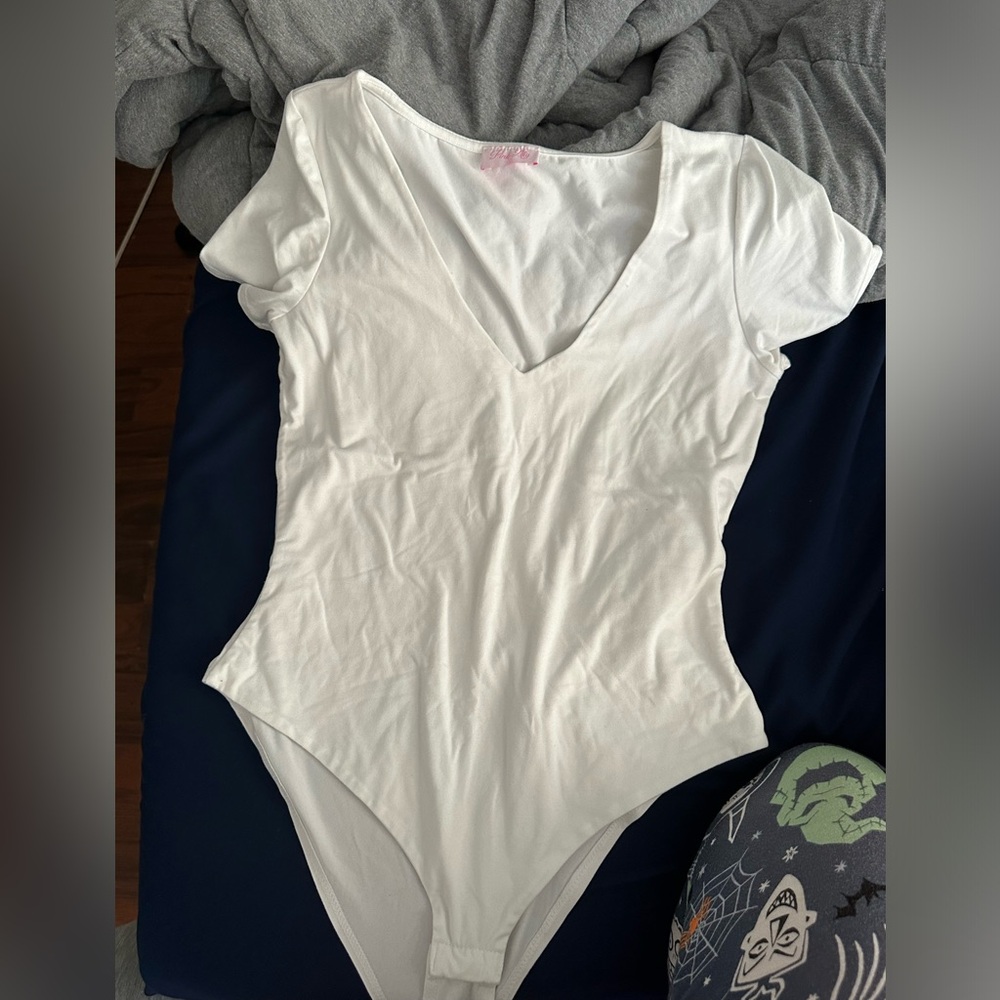 pink lily bodysuit/ size large